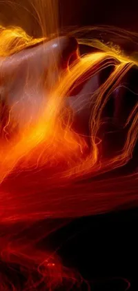 Looking for a dynamic phone live wallpaper that will catch the eye? Look no further than this stunning digital art of fire in motion