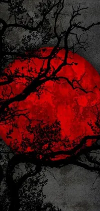 This phone live wallpaper features a tree with a red moon in the background, perfect for dark metal music fans