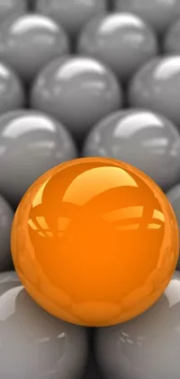 Looking for a visually captivating live wallpaper for your phone? Check out this dynamic option featuring an orange sphere atop a cluster of gray balls
