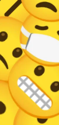 This phone live wallpaper features a pile of yellow emoticons with different expressions