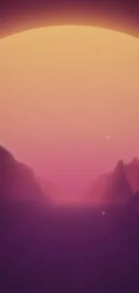 This lively phone wallpaper depicts a mountain range at sunset with a pink fog background