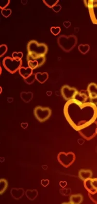 Add a touch of romance and love to your phone with this stunning live wallpaper! Featuring beautifully animated hearts in shades of red and orange, this design creates a warm and loving ambiance on your screen