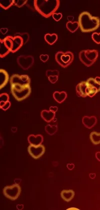 Bring your phone screen to life with this Hearts of Gold Live Wallpaper! An ode to love and romance, this stunning wallpaper features a bunch of intricately arranged heart-shaped lights that pulse and glow in warm tones of red and gold