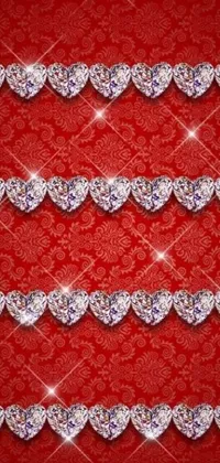 This live phone wallpaper is a stunning display of ornate hearts on a bright red background