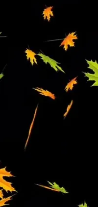 Get ready for a stunning live wallpaper for your phone! Delight in a mesmerizing display of leaves dancing in the air, complemented by beautiful galactic meteors falling from the skies