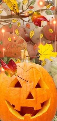 This lively phone wallpaper features an intricately carved pumpkin atop a heap of gourds