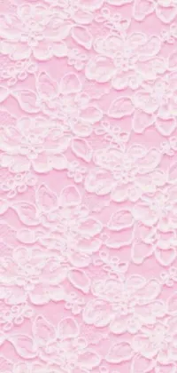 This charming live wallpaper offers a high-detailed design, featuring a pastel pink cotton candy background with intricate white lace patterns