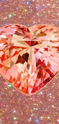 The Pink Diamond Heart Live Wallpaper is a trendy and vibrant addition to your phone
