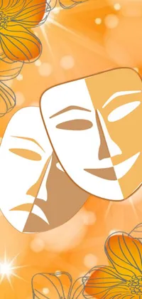 This phone live wallpaper features a vibrant image of two decorative masks in vector art style, set against a marigold background reminiscent of Broadway theater