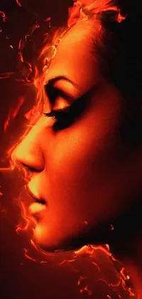 This phone live wallpaper boasts a brilliant digital art piece featuring a fierce woman with flames bursting from her face