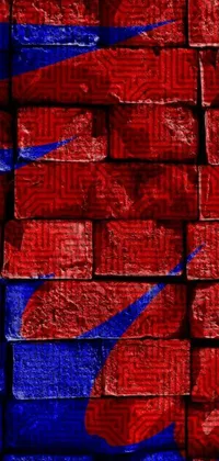 This phone live wallpaper features a striking design of red and blue bricks stacked with layered thick brush marks