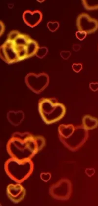 This is a stunning phone live wallpaper featuring red and yellow hearts swirling on a black background, accompanied by a mosque picture with a beautiful night sky and crescent moon in the backdrop
