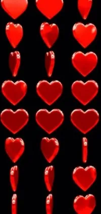 This live wallpaper for your phone features vibrant red hearts set against a sleek black backdrop
