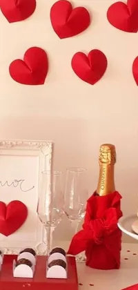Looking for a romantic Valentine's Day phone wallpaper? Check out our latest live wallpaper featuring a beautifully decorated table with red paper hearts and confetti