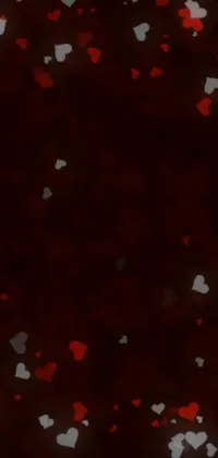 This live phone wallpaper features red and white hearts on a black background, adding a romantic and aesthetic touch to your screen