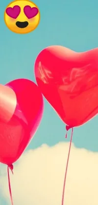 Looking for a beautiful and romantic live wallpaper for your phone? Check out this gorgeous design featuring heart-shaped balloons gently floating against a bright blue sky