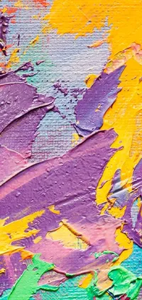 This phone live wallpaper depicts a close up of a colorful painting on canvas