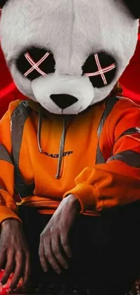 This trendy live wallpaper features a panda mask, cyberpunk art, and furry elements in an eye-catching orange and red color scheme