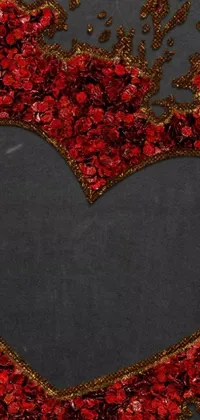 This live wallpaper features a beautiful floral heart on a black, red, and golden background