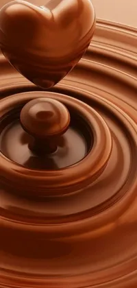This live wallpaper depicts a digital rendering of a chocolate heart floating in a pool of chocolate