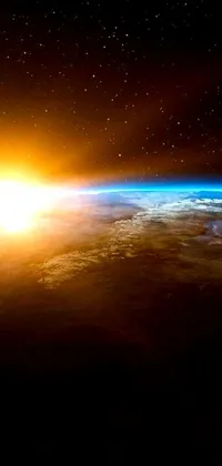 Enjoy the stunning view of the earth as the sun rises in this live wallpaper