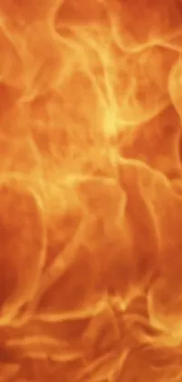 This phone live wallpaper features a stunning close-up of flickering flames from a fire