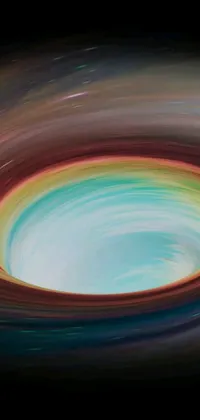 This scenic live wallpaper depicts a striking black hole with a rainbow swirl around it