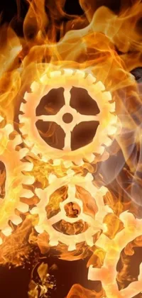 This phone live wallpaper displays a mesmerizing collection of spinning gears that are on fire, highlighting the intricate details of a holy machine