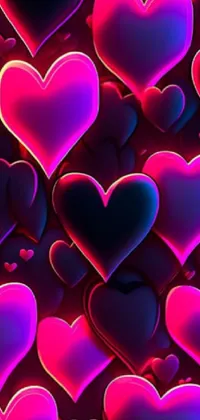 This live wallpaper features a beautiful design of animated hearts in pink and blue shades on a black background