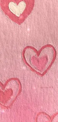 This live phone wallpaper depicts a digital rendering of a red heart-design on a piece of paper