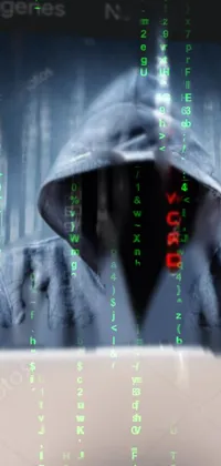 This smartphone wallpaper boasts a modern, cyber wear aesthetic, featuring a human figure wearing a hoodie and typing on a laptop