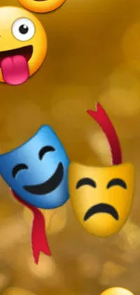 This phone live wallpaper features colorful emoticons floating in the air alongside a theater mask and a dynamically changing background picture