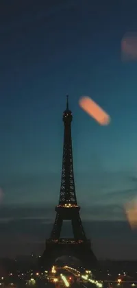The Eiffel Tower Live Wallpaper showcases one of Paris' most recognized landmarks in a stunning view at nighttime