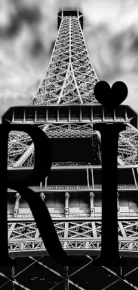 This stunning live phone wallpaper showcases a high definition black and white photograph of the iconic Eiffel Tower
