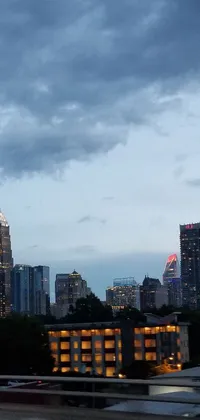 This phone live wallpaper presents a remarkable view of a city as seen from a moving car during an evening storm