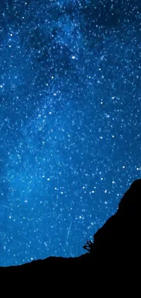 This stunning phone live wallpaper showcases a captivating and breathtaking nighttime scene