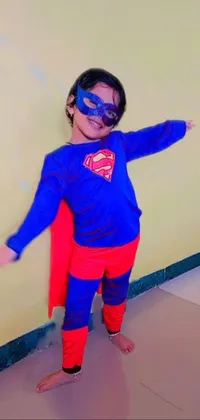 This dynamic live wallpaper features a little girl dressed as a famous male hero