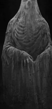This phone live wallpaper displays a black and white image of a ghost wearing a funeral veil