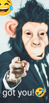 Looking for a playful and energetic live wallpaper for your phone? Check out this funky design featuring a monkey in a suit pointing directly towards the camera! Complete with a brand new emoji of someone biting their lip seductively, this vibrant background is perfect for those who love quirky and unique designs