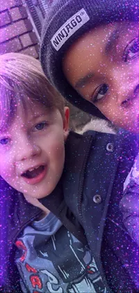 This phone live wallpaper features two young boys enjoying the bustling city of London