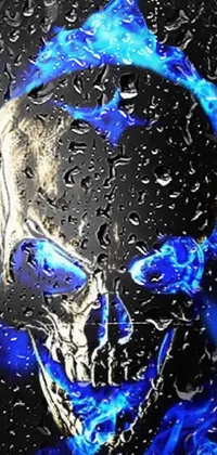 Looking to add an edgy touch to your phone's background? Check out this live wallpaper featuring a highly detailed blue fire skull on a black background, complete with a pentagram symbol