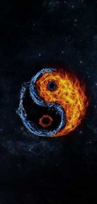 This phone live wallpaper depicts a fiery yin yang symbol, promoting balance and harmony