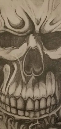 This skull live wallpaper features a detailed drawing of a grinning skull on paper
