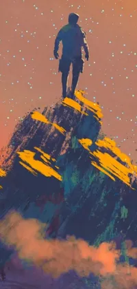 This phone live wallpaper depicts a man standing on a mountain with stunning landscape views