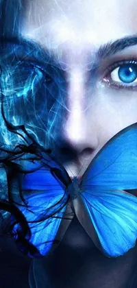 This phone live wallpaper showcases a captivating image of a woman holding a blue butterfly in her mouth against a backdrop of a mesmerizing blue fire