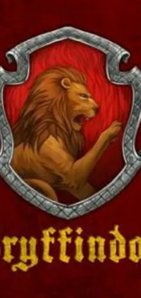 Looking for a magical live wallpaper for your phone? Look no further than this stunning red book cover with a golden lion design and clubs and wands at the bottom