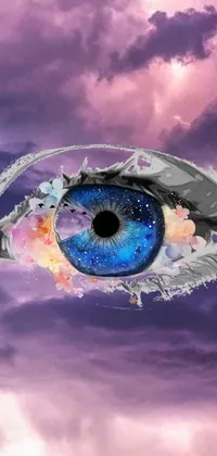 This phone live wallpaper displays a unique and eye-catching close-up of an ethereal eye in the sky, using striking blue and purple tones capturing the surreal details and textures