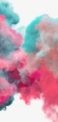Transform the appearance of your phone with this incredibly mesmerizing live wallpaper! Capturing a close-up view of coloured smoke, this phone wallpaper features a blend of teal and pink colours that creates an intriguingly beautiful look