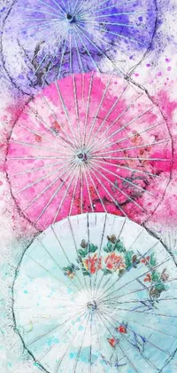 This live wallpaper features a beautiful watercolor painting of three stacked umbrellas in pink, white, and turquoise tones