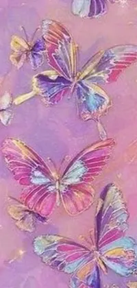This phone live wallpaper features a vibrant airbrush painting of butterflies on a purple background